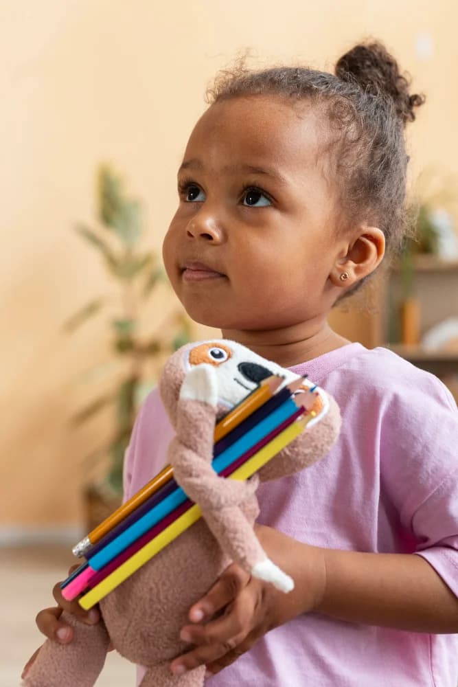 a kid looking and smiling