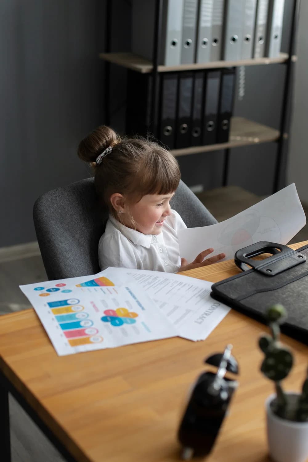 A kid checking some statistical pages